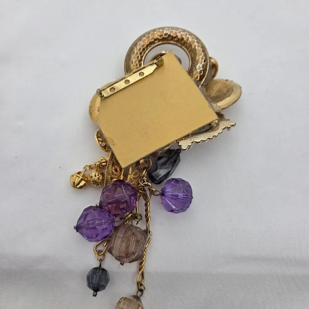 Vintage Maximalist Assemblage Brooch - Gold Tone with Purple Dangle Charms